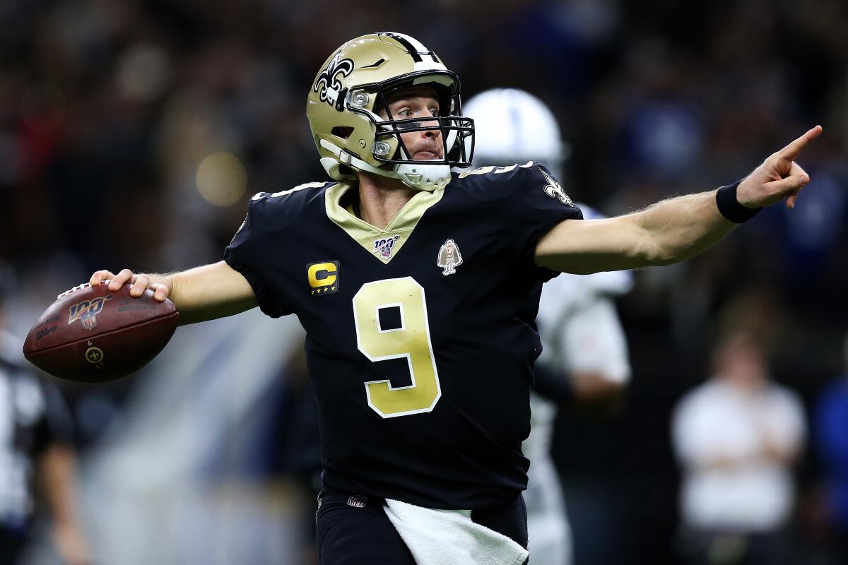 Saints quarterback Drew Brees drops back to pass during a game against the Colts on Dec. 16 at the at Mercedes-Benz Superdome.