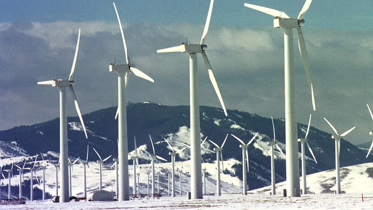 Wind turbines spin at the Foote Creek Rim site in Carbon County, Wyo.
