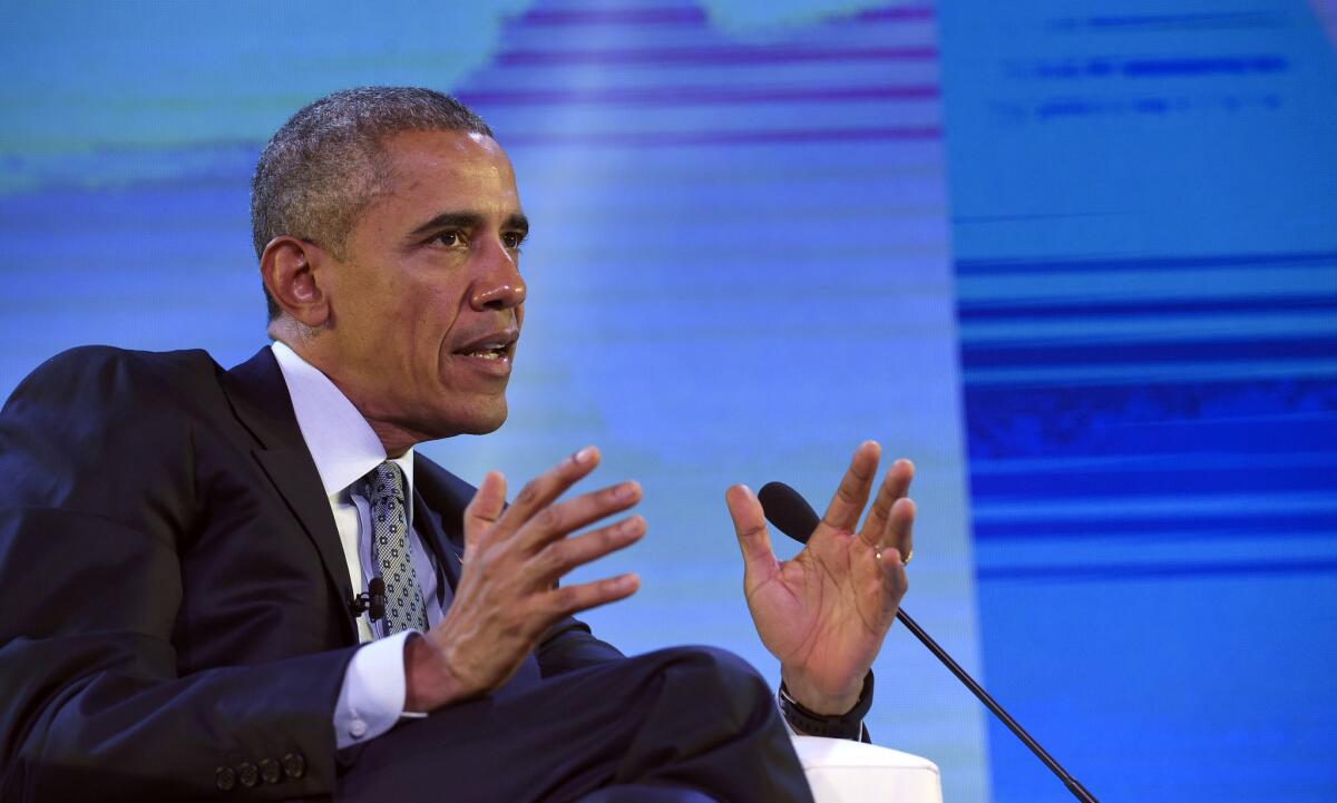 President Obama speaks to business leaders at an international summit in Manila on Wednesday.