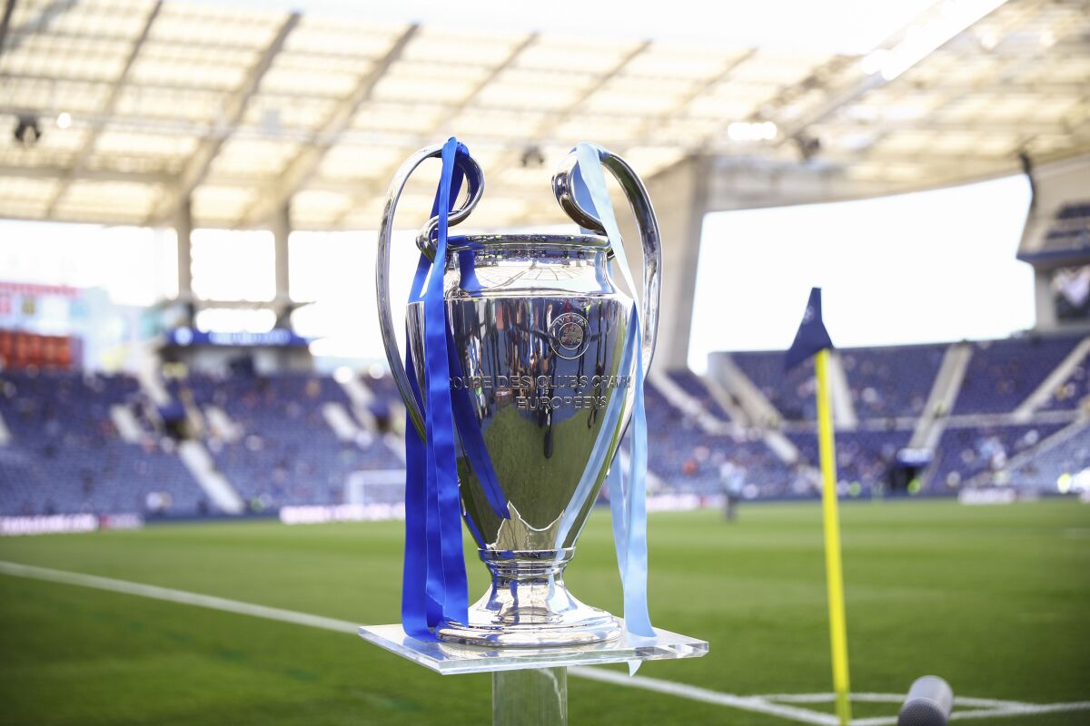 The Champions League trophy is displayed prior to the start of the Champions League final soccer match between Manchester City and Chelsea at the Dragao Stadium in Porto, Portugal, Saturday, May 29, 2021. (Carl Recine/Pool via AP)