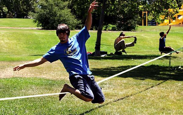Mike Payton demonstrates slacklining -- the sport of walking on a small, flat nylon rope -- in Westlake Village.