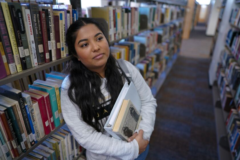 Chula Vista, CA - February 01: Abril Hernandez, 33 arrived early at the library to work on her class assignment. 