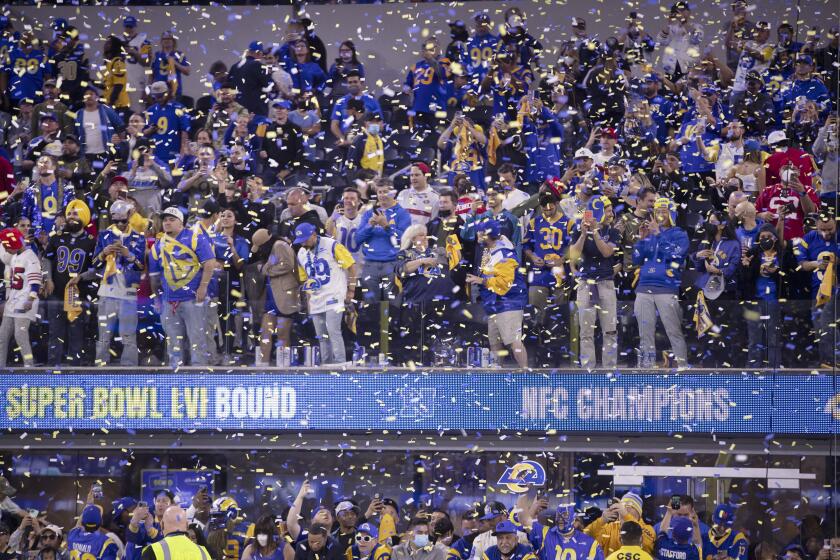 Los Angeles, CA - January 30: Confetti rains down as Rams fans celebrate the Rams 20-17 victory over the San Francisco 49ers in the NFC Championships at SoFi Stadium on Sunday, Jan. 30, 2022 in Los Angeles, CA. (Allen J. Schaben / Los Angeles Times)