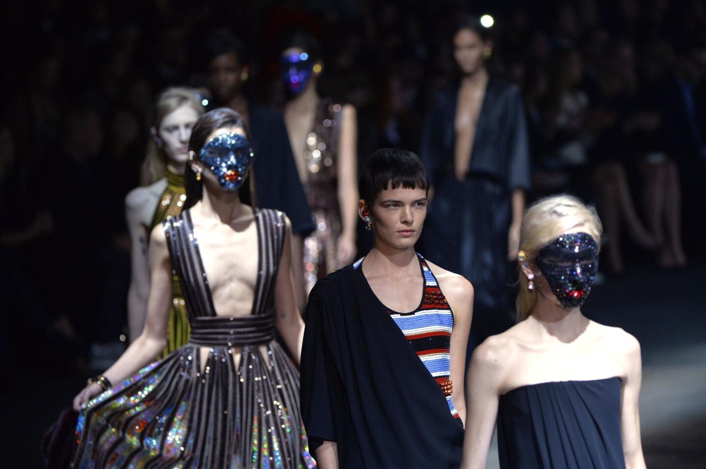 Givenchy shows haute tribal looks during spring/summer 2014 Paris Fashion Week.