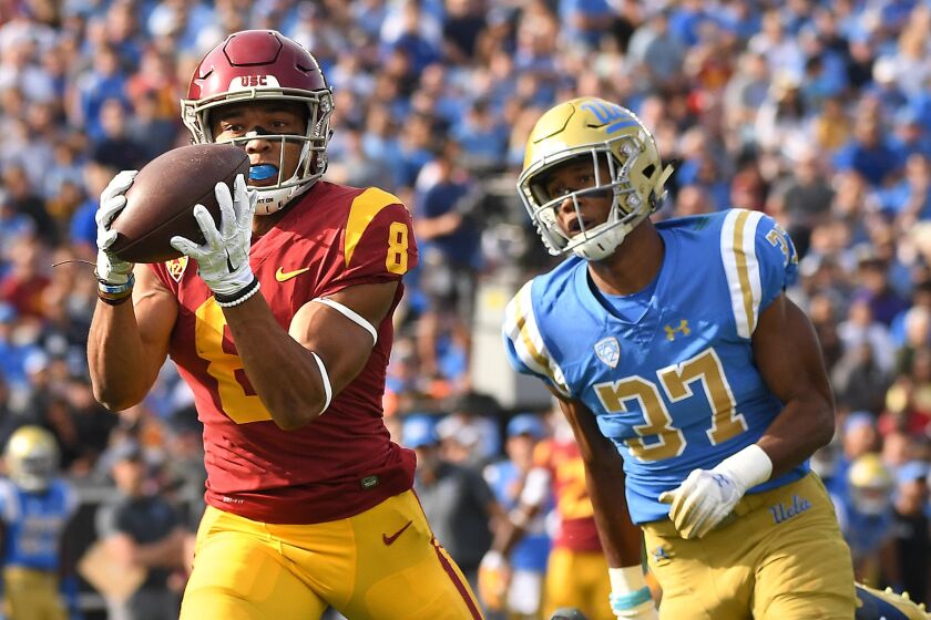 USC receiver Amon-ra St. Brown scores a touchdown against UCLA in 2018.