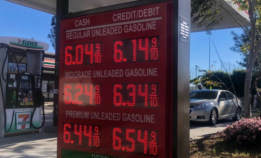 Posted prices at a 7-11 gas station in Linda Vista .