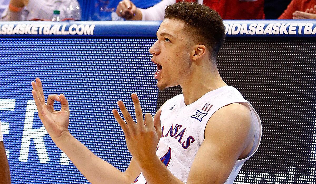Brannen Greene of the Kansas Jayhawks reacts after making a three-pointer and being fouled during the game against the Kansas State Wildcats on Wednesday.
