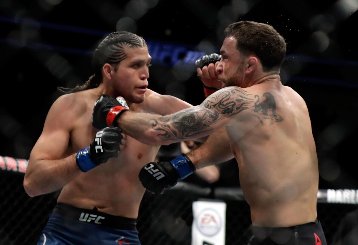 Brian Ortega fights Frankie Edgar during a featherweight bout at UFC 222 in March 2018.