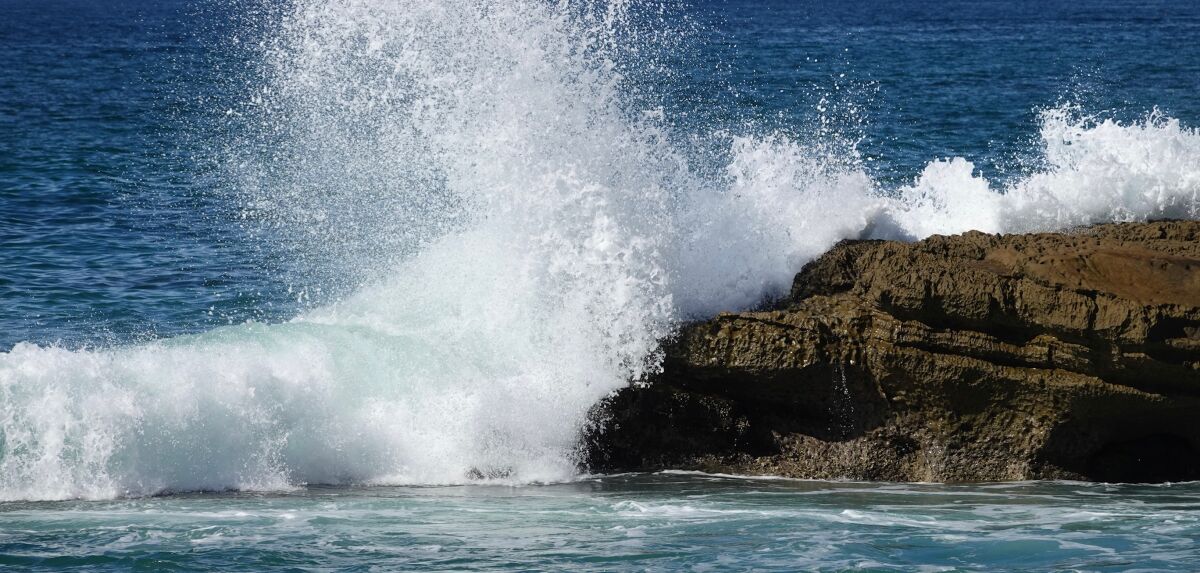 Beach-goers should stay off low lying rocks on Monday due to heavy surf.