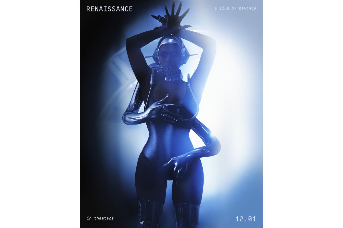 Beyoncé wears a silver unitard as she raises her hands above head as silver arms wrap around her body
