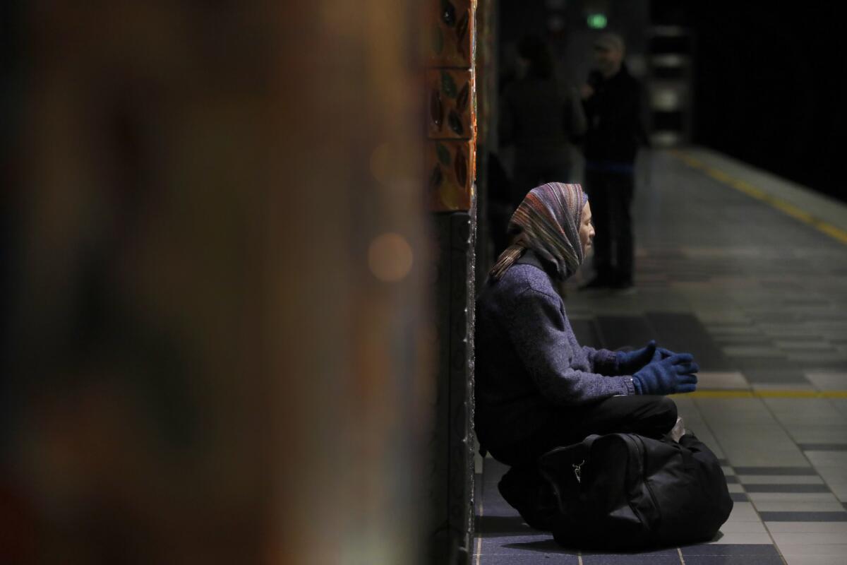 A man sitting on the floor was counted in the Greater Los Angeles Homeless Count by PATH (People Assisting The Homeless) workers at the Universal City/ Studio City metro station.