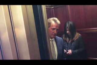 Jeff Flake confronted by two women in an elevator