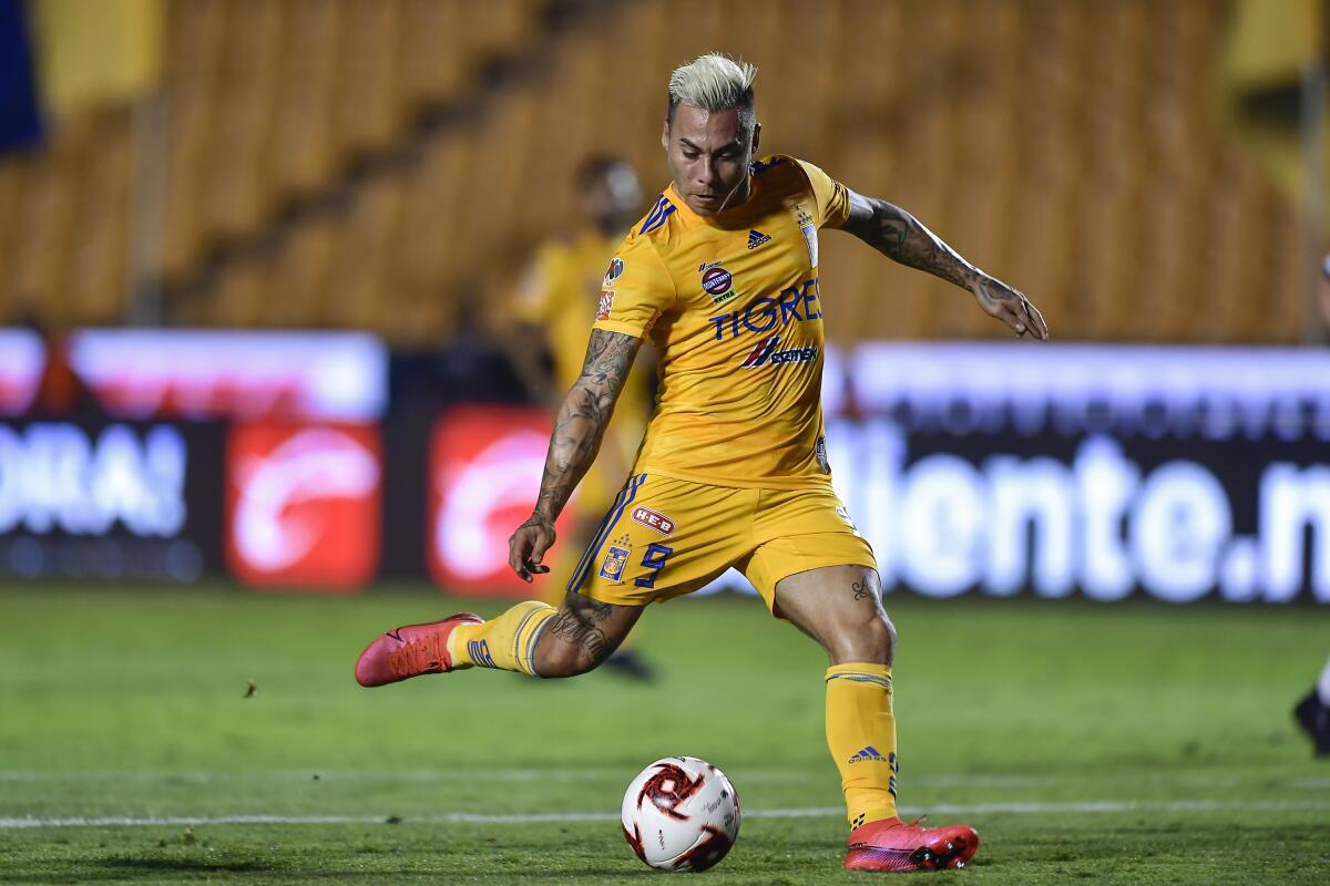 MONTERREY, MEXICO - MARCH 14: Eduardo Vargas #9 of Tigres kicks the ball and scores his team’s third goal during the 10th round match between Tigres UANL and FC Juarez as part of the Torneo Clausura 2020 Liga MX at Universitario Stadium on March 14, 2020 in Monterrey, Mexico. (Photo by Azael Rodriguez/Getty Images)