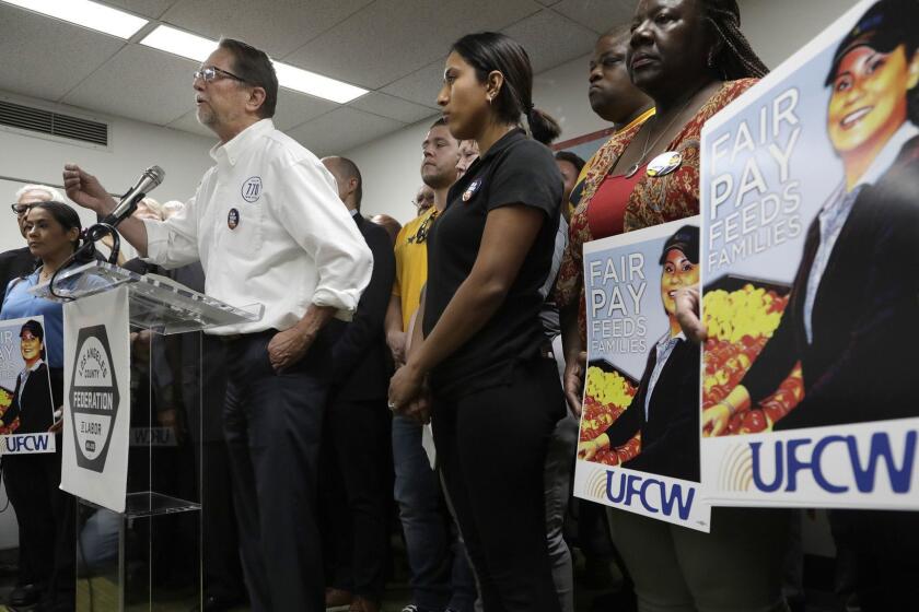 LOS ANGELES, CA -- JULY 01, 2019: John Grant, president of UFCW 770, stands with members of UFCW and other unions (healthcare, law enforcement, teacher) as he argues for better pay for its members. The UFCW approved a strike motion Monday afternoon. (Myung J. Chun / Los Angeles Times)