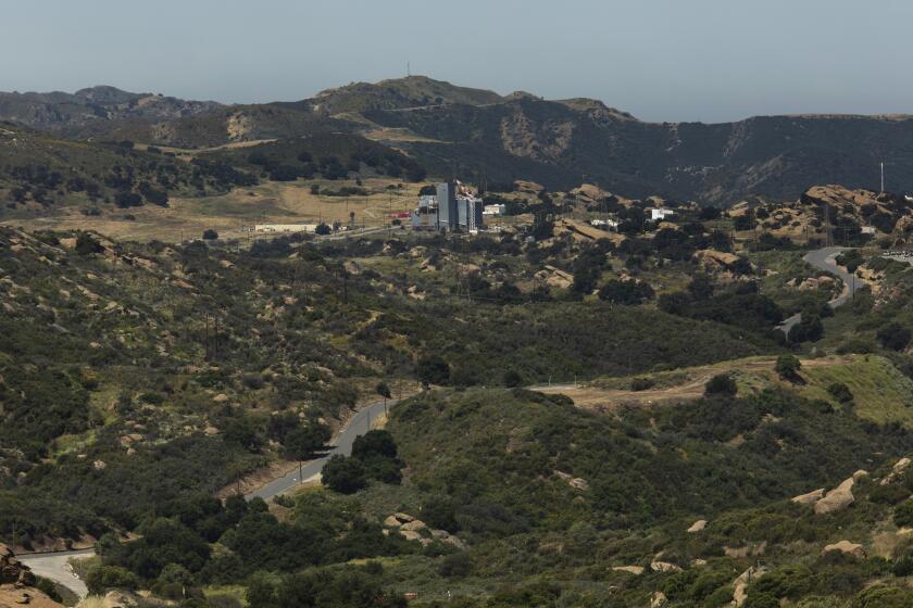 VENTURA COUNTY, CA-JUNE 4, 2020: Overall, shows the Santa Susana Field Facility as seen from a ridgeline in unincorporated Ventura County. Six decades after America's first nuclear meltdown, hundreds of radioactive hot spots remain at the former research facility. 10 years after state and federal agencies agreed to clean up the site owned by Boeing Co. and NASA, the work has not even started. (Mel Melcon/Los Angeles Times)