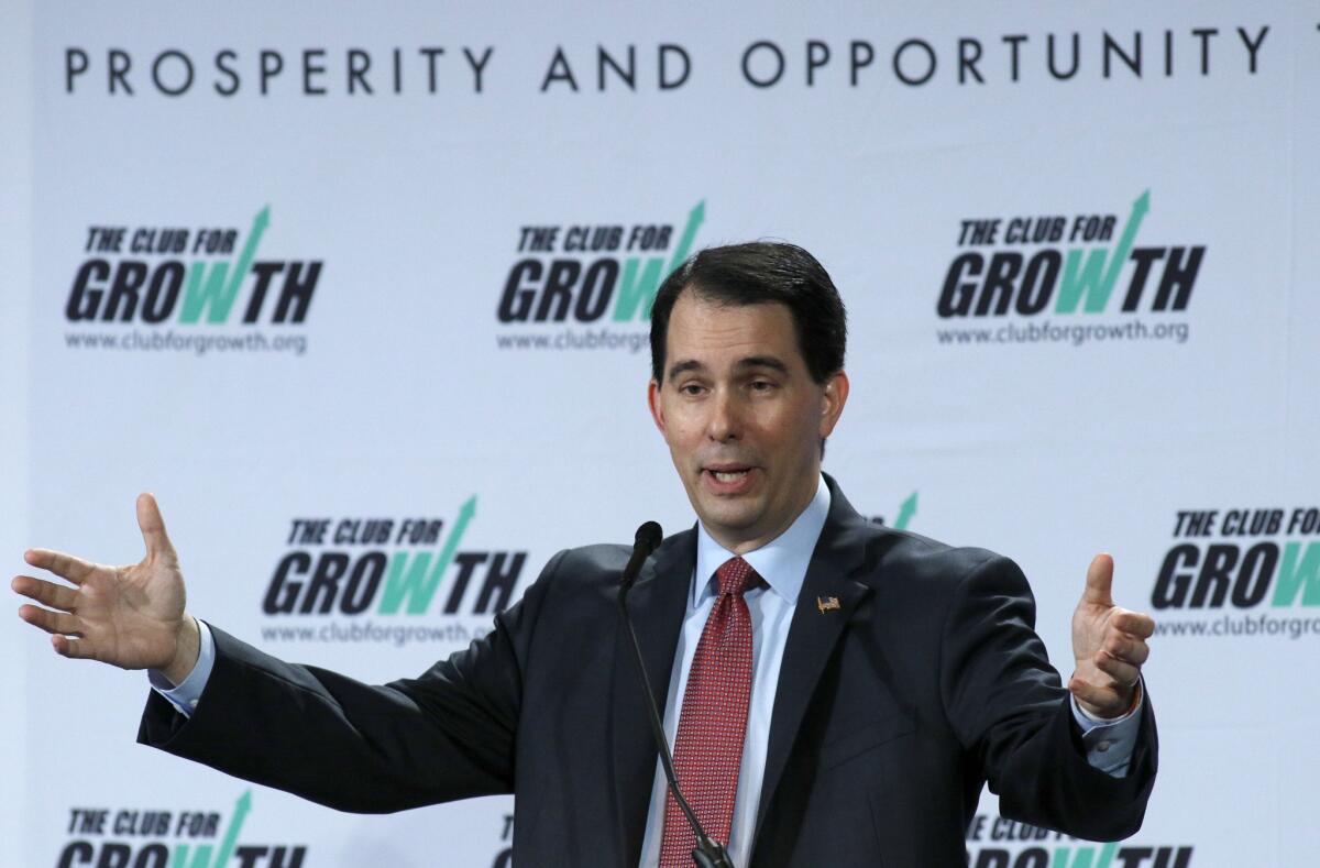 Wisconsin Gov. Scott Walker speaks at the winter meeting of the free-market oriented Club for Growth, held Saturday Feb. 28 in Palm Beach, Fla.