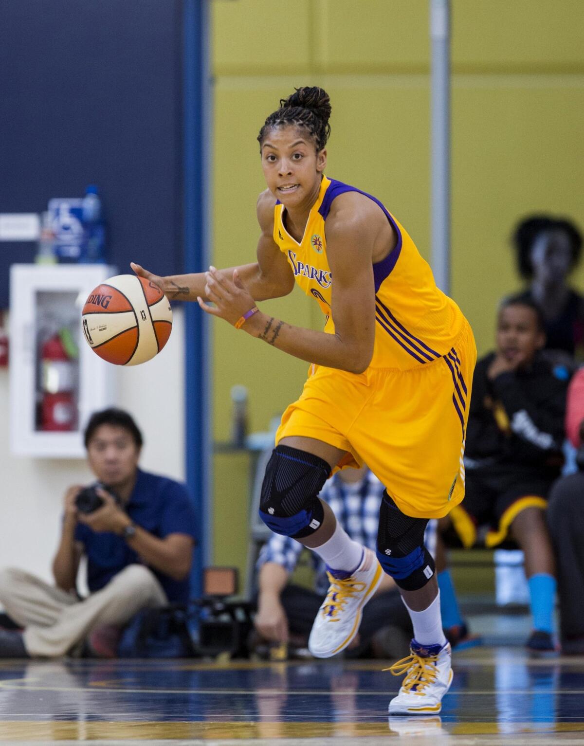 Candace Parker had 24 points in the Sparks' 87-77 win over the Tulsa Shock, L.A.'s first win since June 6.