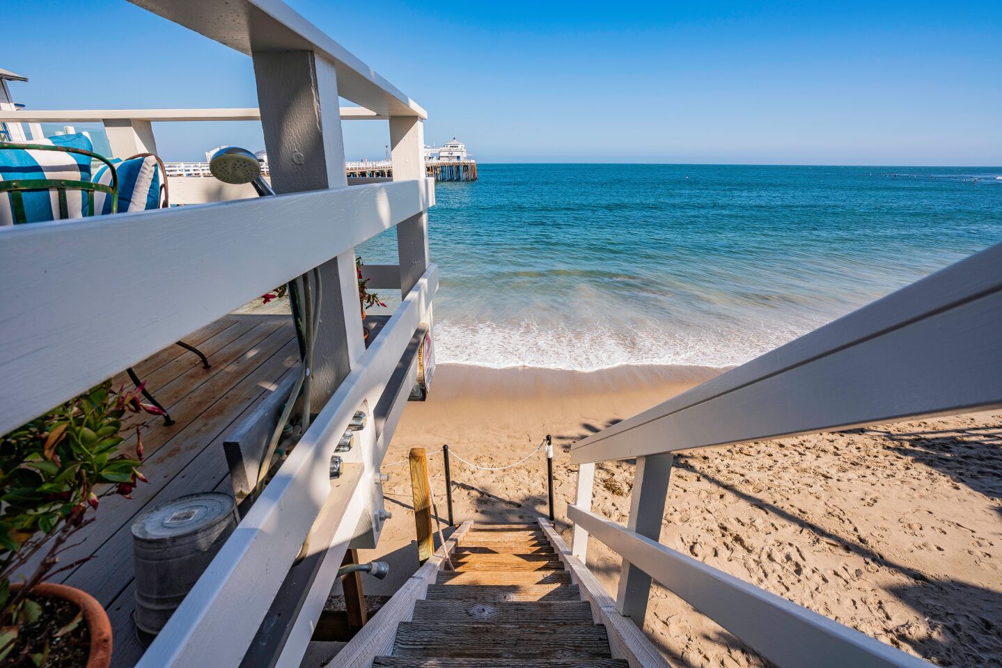 A private staircase leads to the beach.