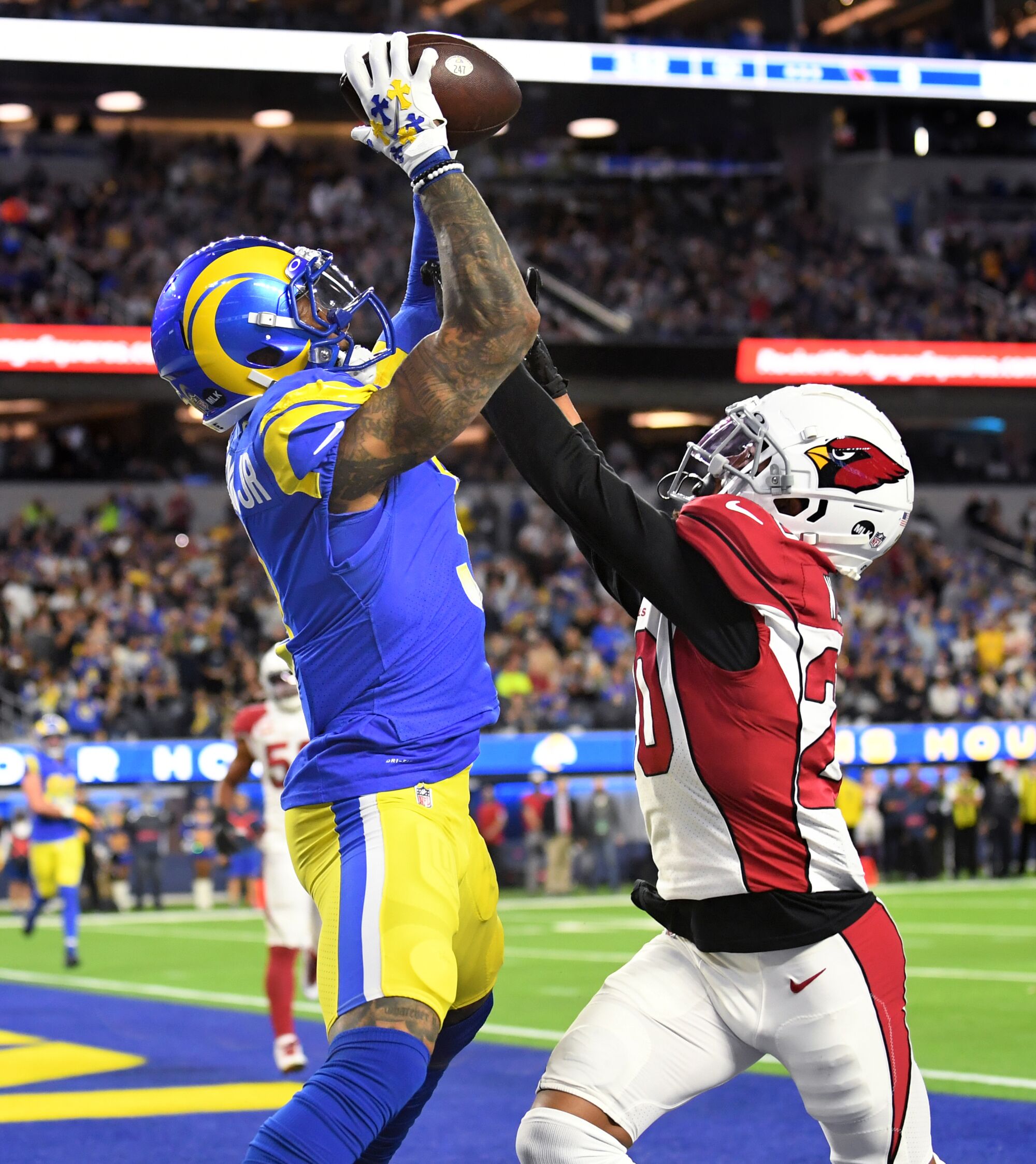 Rams receiver Odell Beckham Jr. catches a touchdown pass in front of Cardinals cornerback Marco Wilson.
