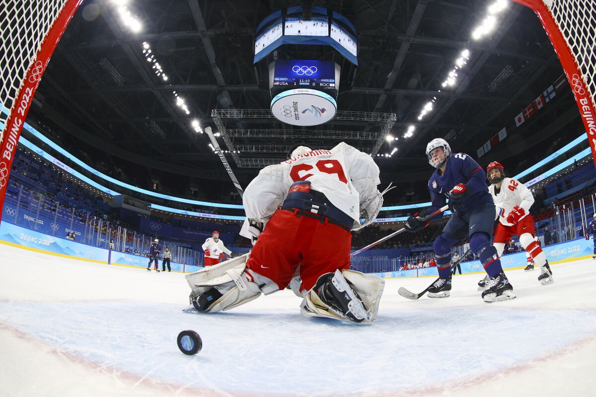 United States' Hilary Knight (21) scores against the Russian Olympic Committee on Saturday in Beijing.