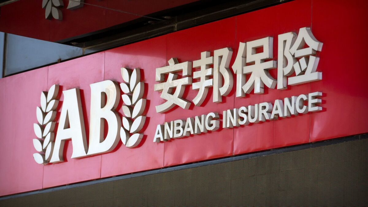 The logo of the Anbang Insurance Group is seen on the company's offices in Beijing on June 14, 2017.