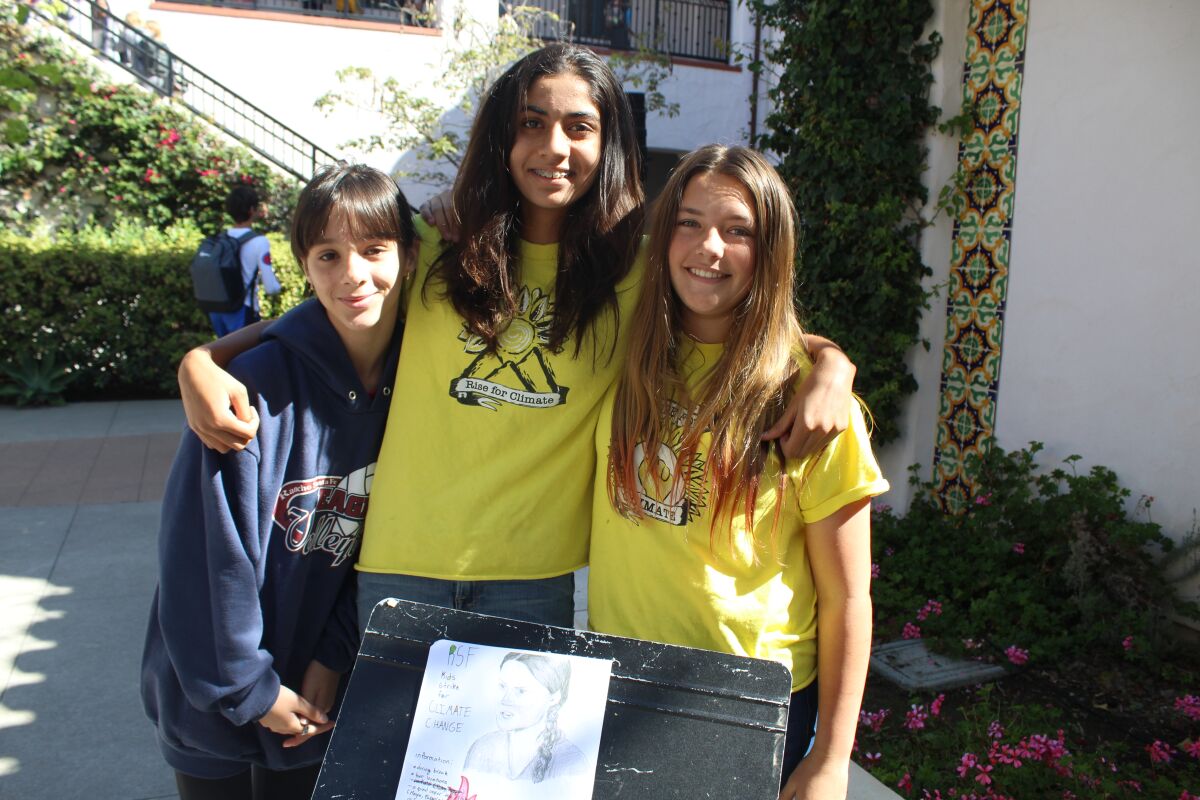 Young climate activists Angela Aguirre, Maya Alam and Fabiola Theberge.
