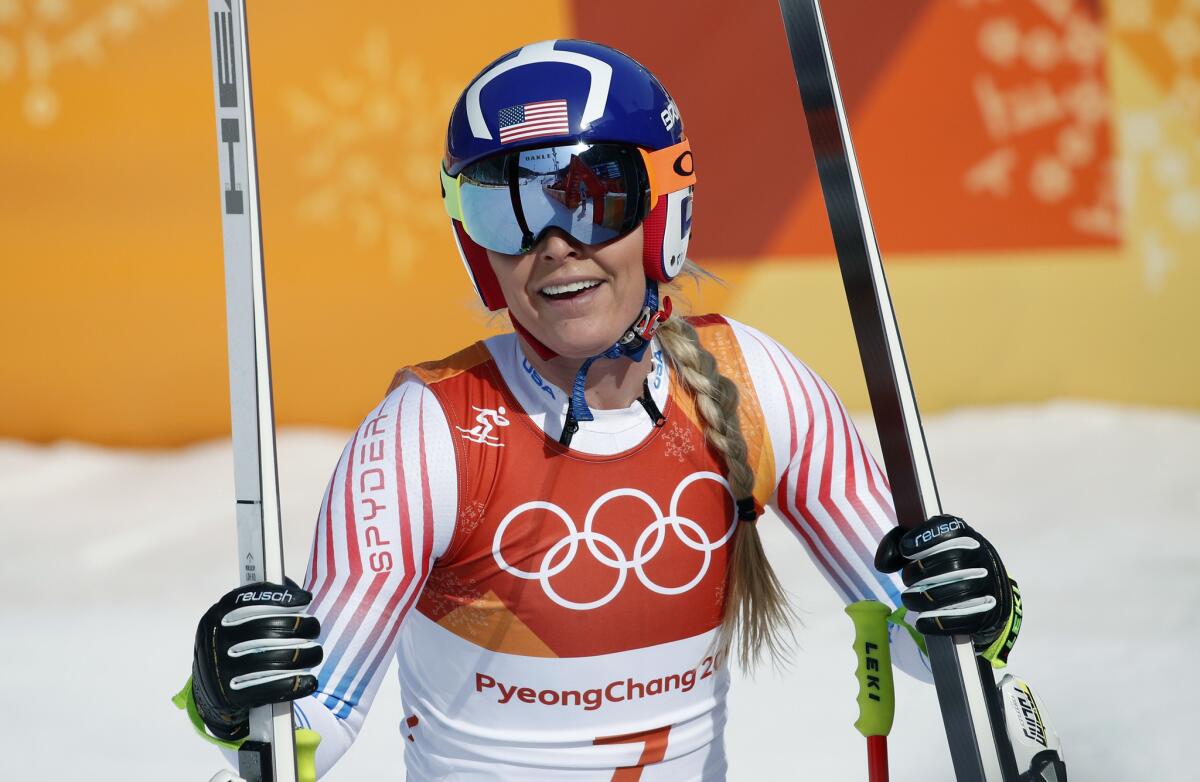 United States' Lindsey Vonn smiles in the finish area after competing in the women's downhill.