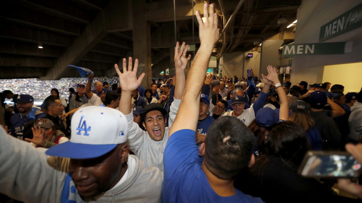 Fans celebrate after the Dodgers beat the Astros 3-1 in Game 6.