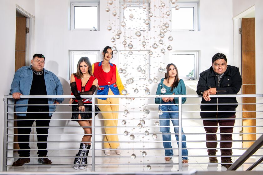 LOS ANGELES, CA - FEBRUARY 09: Inside the 'Familia Fuego' TikTok content house in the Hollywood Hills on Wednesday, Feb. 9, 2022 in Los Angeles, CA. The all-Latino members include, from left: Jesus Zapien, Isabella Ferregur, Alexia Del Valle, Monica Villa and Leo Gonzalez. (Mariah Tauger / Los Angeles Times)