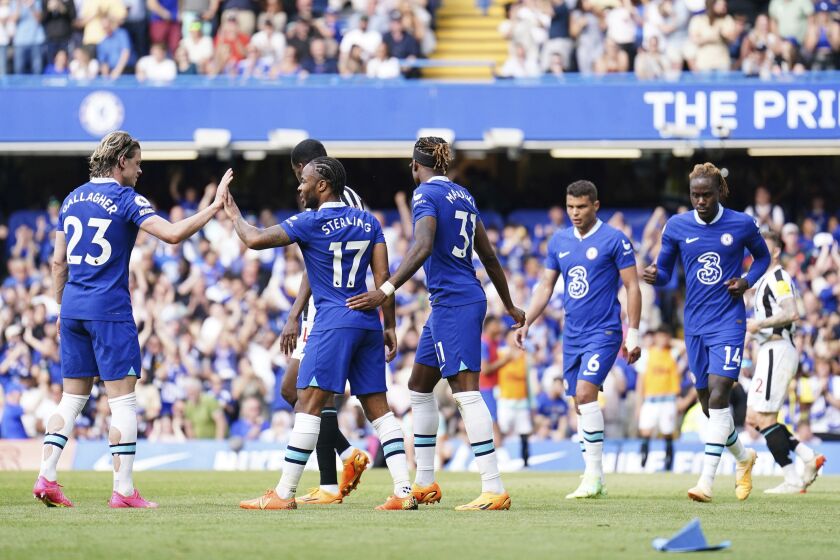 Chelsea celebrate an own goal by Newcastle United's Kieran Trippier, during the English Premier League soccer match between Chelsea and Newcastle United, at Stamford Bridge, London, Sunday May 28, 2023. (Zac Goodwin/PA via AP)