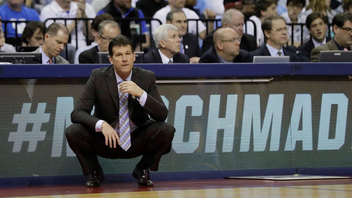 UCLA Coach Steve Alford watches the Bruins play against Kentucky in Memphis, Tenn., on March 24.