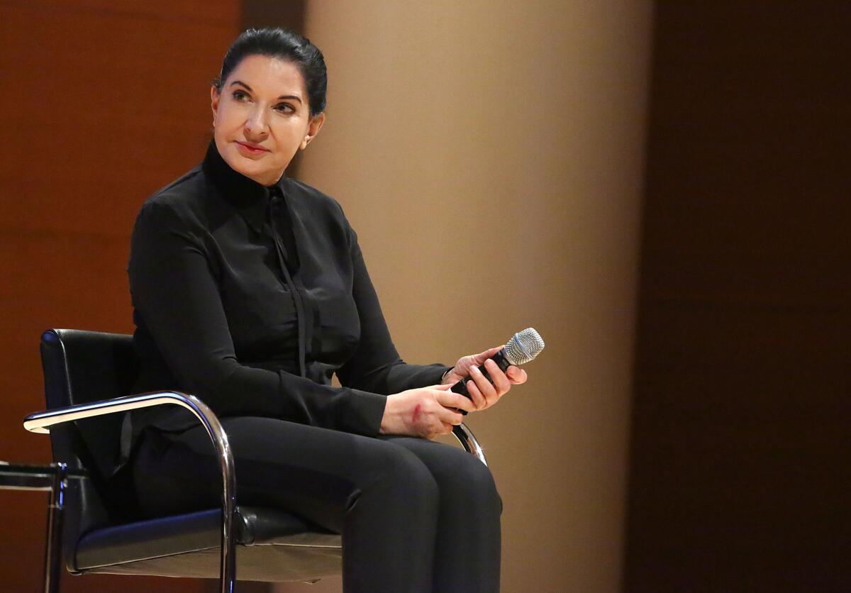 Performance artist Marina Abramovic was recently sued by her former partner Ulay over issues of credit and payment. The artist is seen at the "Women in the Arts" luncheon at the Brooklyn Museum in early November.