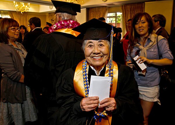 Masaye Nagao Nakamura is happy to get an honorary diploma.