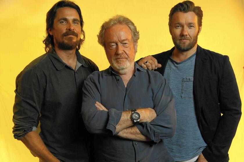 Director Ridley Scott is flanked by actors Christian Bale, left, and Joel Edgerton.