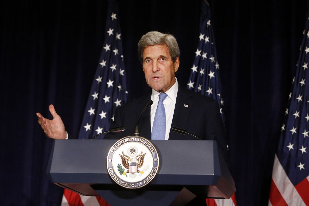 Secretary of State John F. Kerry speaks in New York on Sept. 22. The State Department says the U.S. is suspending bilateral contacts with Russia over Syria.