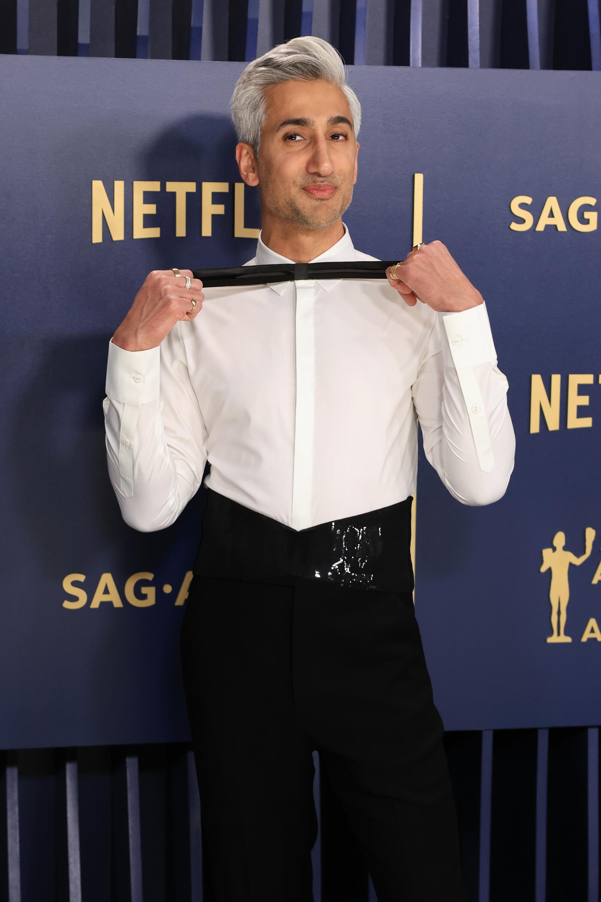 Tan France shows off his unorthodox bow tie at the Screen Actors Guild Awards.