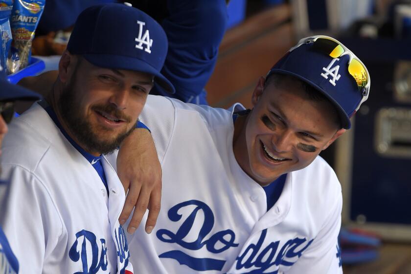 Chris Heisey, left, started in place of Joc Pederson in center field for the Dodgers on June 7 during a game against the St. Louis Cardinals.