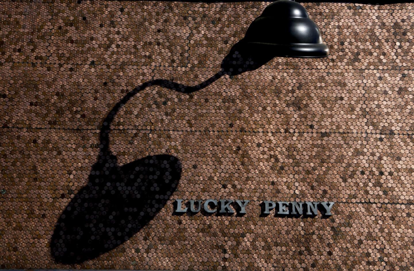 The new Santa Barbara restaurant Lucky Penny is tiled in real pennies. Though real coins have been used as tile before, including on the restaurant floor in the Standard Hotel in New York, Lucky Penny's installation is more ambitious because it's a vertical surface.