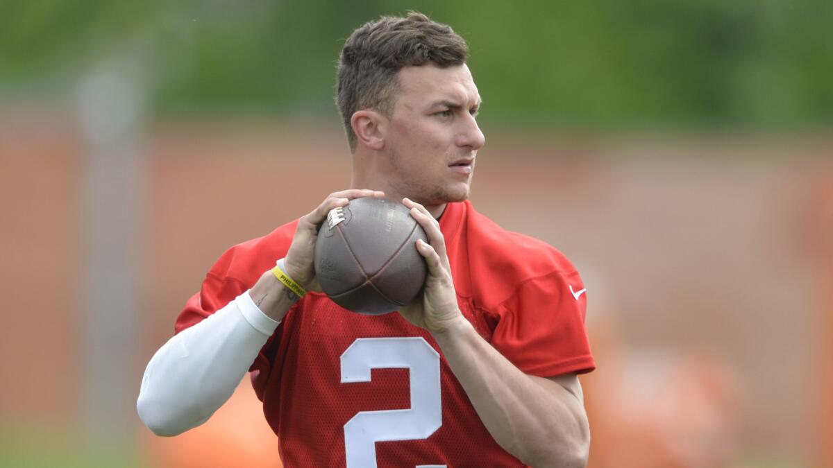 Cleveland Browns quarterback Johnny Manziel looks to pass during an organized team activity in Berea, Ohio, last Tuesday.