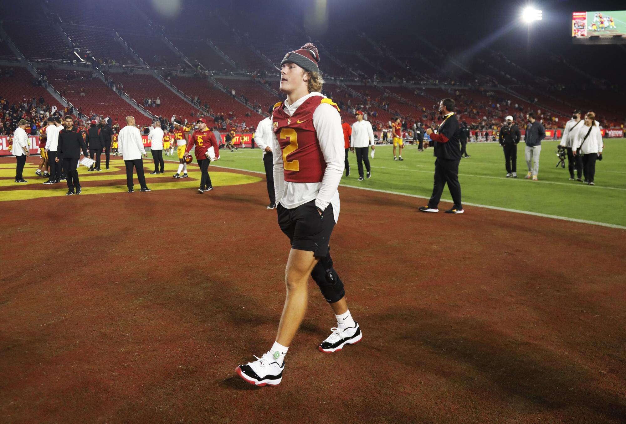 Injured USC quarterback Jaxson Dart leaves the field after the Trojans' 45-27 loss to Oregon State on Sept. 25.