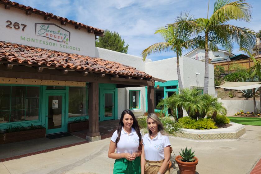 Ivonne Aguilar, left, and Elia Heredia of Blooming House Montessori School.