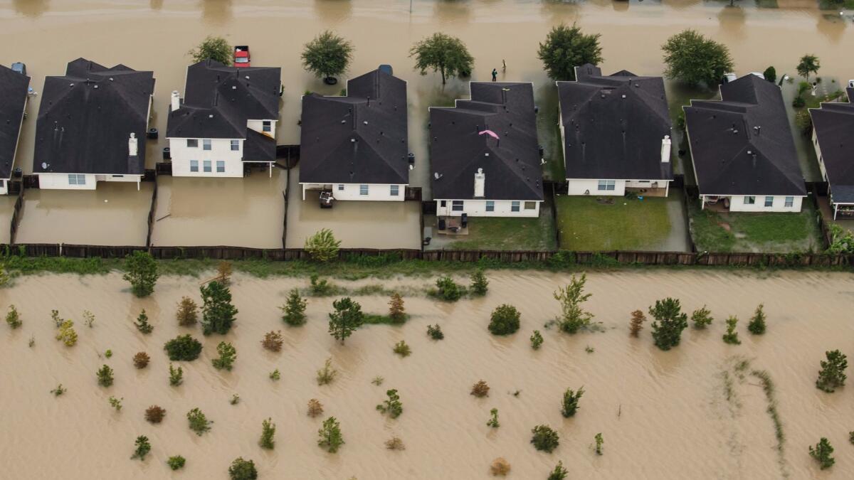 Residential neighborhoods near Interstate 10 in Houston sit in floodwater in the wake of Hurricane Harvey in August.