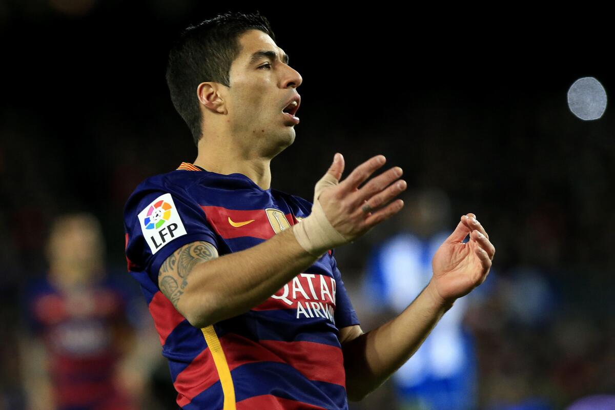 Barcelona forward Luis Suarez reacts after missing a goal opportunity during a Spanish Copa del Rey against RCD Espanyol at the Camp Nou Stadium.