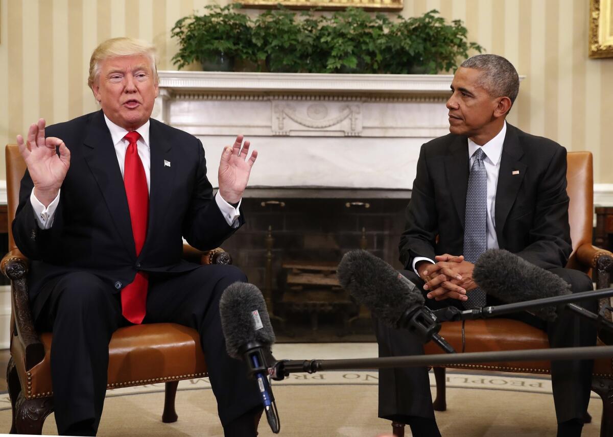 President-elect Donald Trump, left, speaks next to President Obama after meeting in the Oval Office on Thursday.