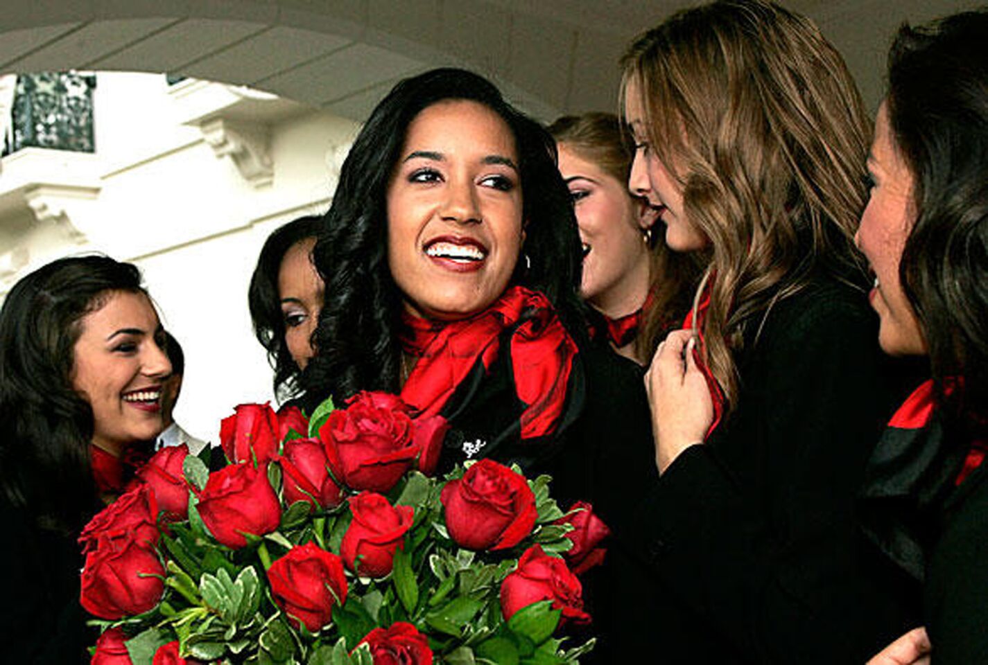 Camille Clark is congratulated by the princesses after being named rose queen for the 2006 tournament.
