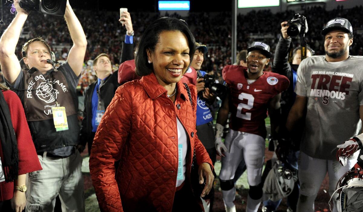 Condoleezza Rice, a Stanford graduate, believe expanding the four-team College Football Playoff could dilute interest in the regular season.
