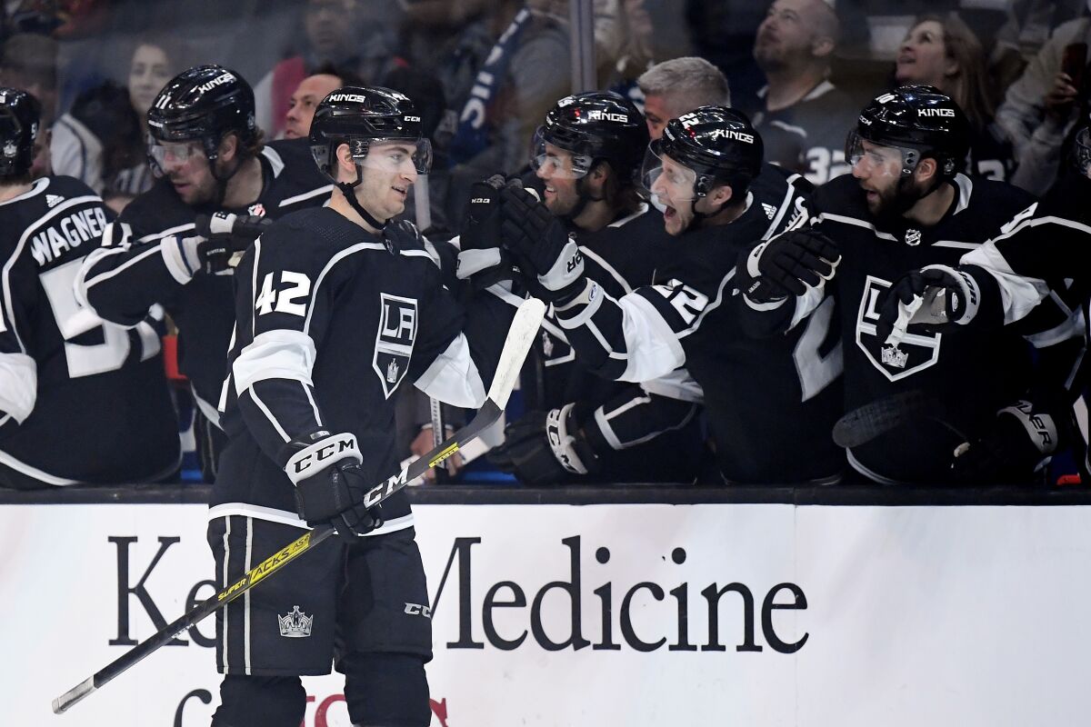 Kings center Gabriel Vilardi celebrates his goal with teammates on the bench Feb. 20, 2020.