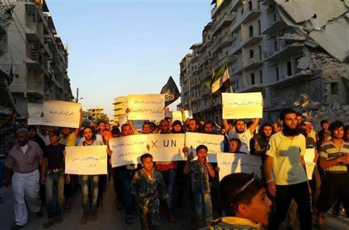 Activistas en la sitiada Alepo protestan contra Naciones Unidas por lo que califican de fracaso a la hora de levantar el cerco en las áreas de la ciudad controladas por rebeldes, el 13 de septiembre de 2016.