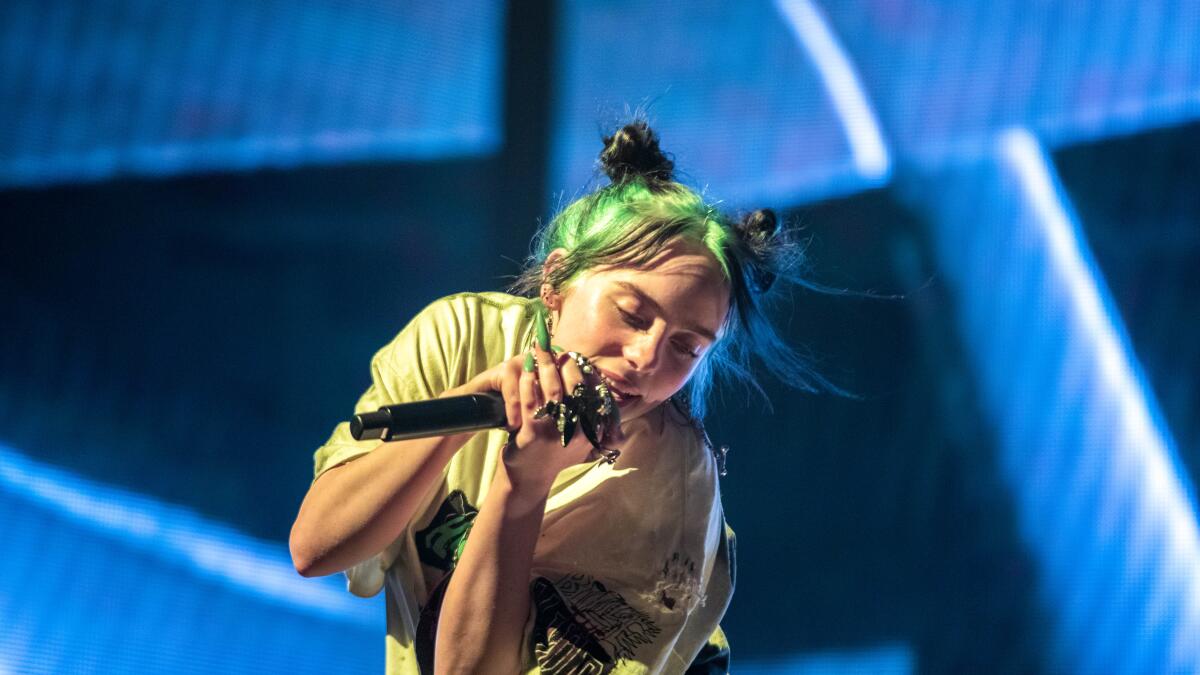 Daniel Caesar performing live on stage during his 2025 tour