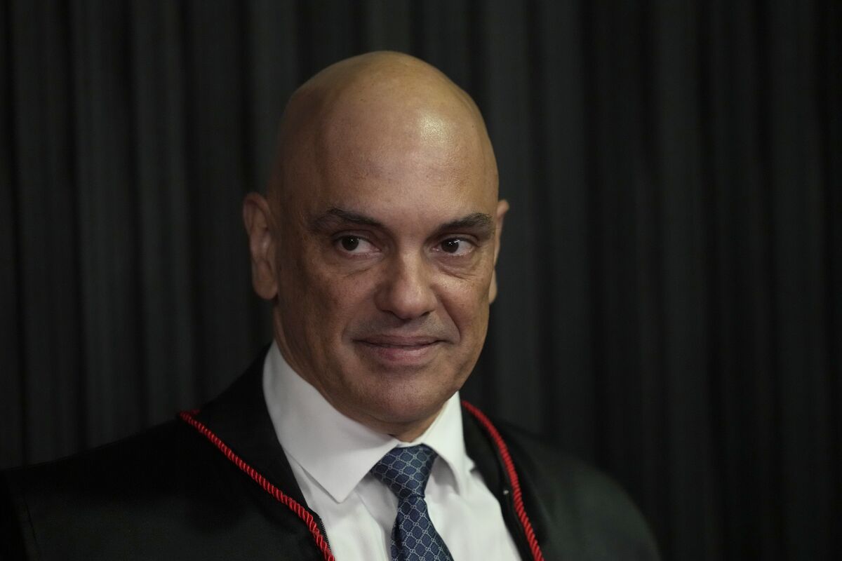 Judge Alexandre de Moraes smiles